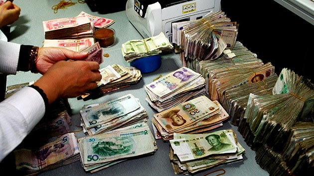 Ante los primeros síntomas, China realiza una inyección récord en el mercado de dinero