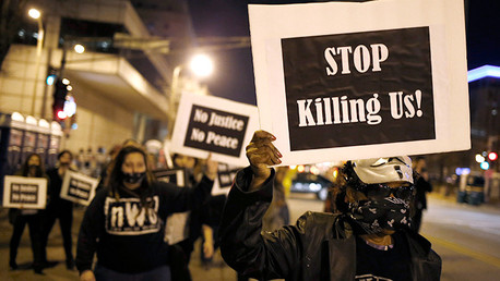 Un afroamericano detenido por el tiroteo contra dos policías en protesta de Ferguson