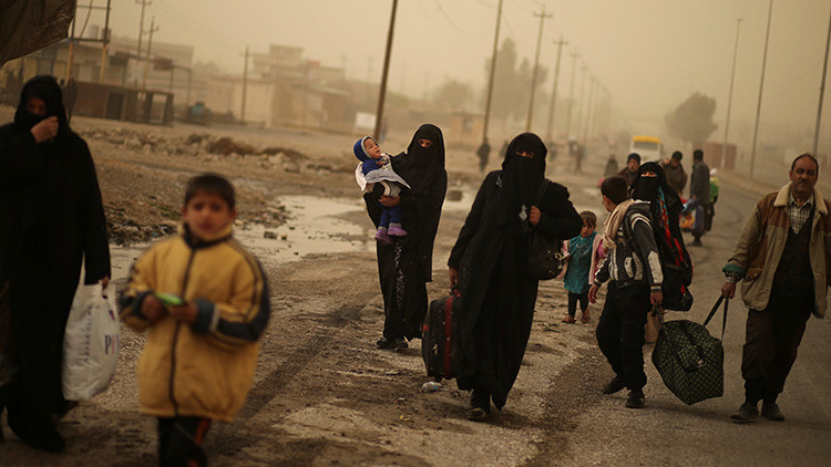 El invierno acecha a Mosul: Los residentes de la ciudad se preparan para la hambruna y el frío