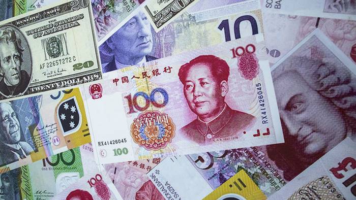 China raises foreign exchange reserve requirements for banks amid yuan strength