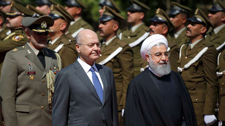 El presidente iraní, Hasán Rohaní, junto con su homólogo iraquí, Barham Salih, durante su visita a Irak. 11 de marzo de 2019.
