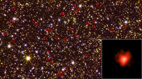 Photo of the Spitzer site telescope with the far remote galaxy. One of them is in the lower right.