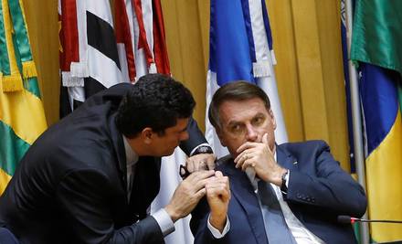 El presidente de Brasil, Jair Bolsonaro, y el hasta ahora ministro de Justicia, Sergio Moro.