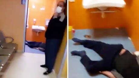 El video de un hombre muerto tirado en el baño de un hospital conmueve a Italia