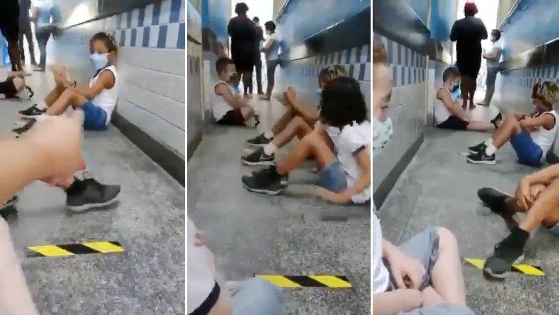 VIDEO: La imagen de unos niños en Río de Janeiro protegiéndose en una escuela de un tiroteo y manteniendo la distancia por el covid-19 se hace viral