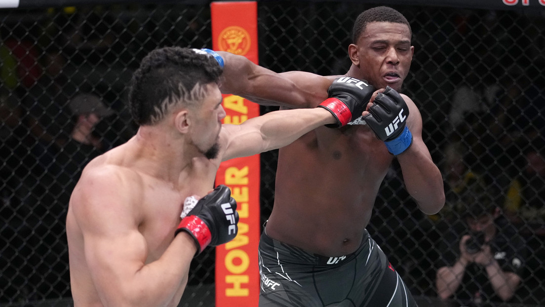 A UFC fighter falls in 'slow motion' after being knocked out by his