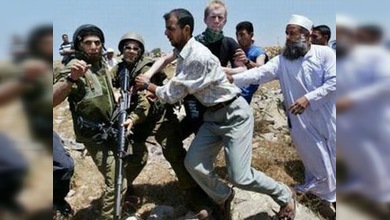 Palestinos e israelíes se manifiestan contra el muro de seguridad