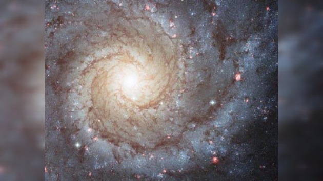 Captan evolución de una galaxia espiral a una elíptica