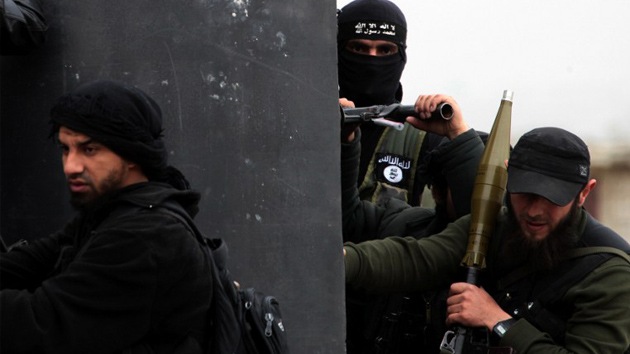 Rebeldes sirios asesinan a un monje católico delante de sus parroquianos