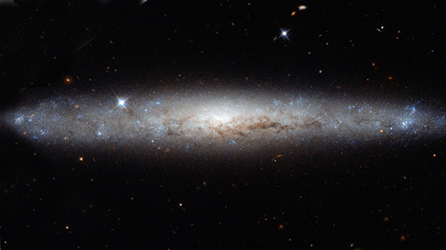 Hubble 'desempolva' una hermosa galaxia espiral