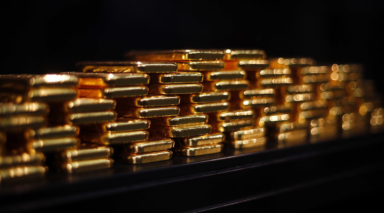 Gold touches 5yr low, as China suspected of heavy selling