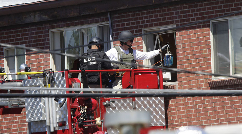 Booby-trapped: 'Sapper' robot explores Colorado theater shooter's mine-studded home (POLICE VIDEO)
