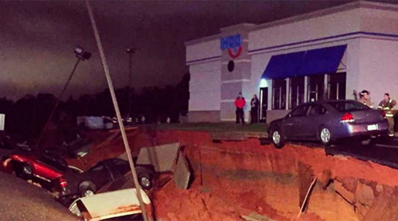 Mysterious giant sinkhole in Mississippi swallows at least ...