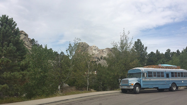 Unemployed man ‘living the dream’ in converted school bus (PHOTOS)