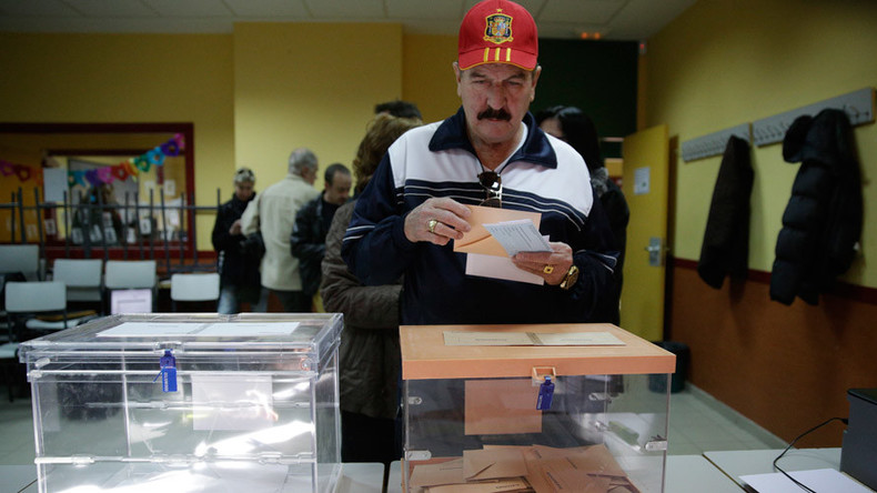 Spain's conservatives face tough challenge from fresh anti-austerity parties as Spaniards vote