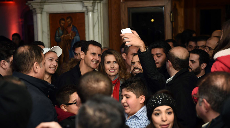 Assad makes surprise Christmas visit to Damascus church (PHOTOS)