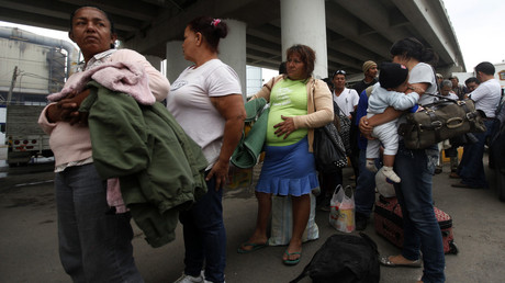 Federal deportation effort begins with pre-dawn raids targeting immigrant families