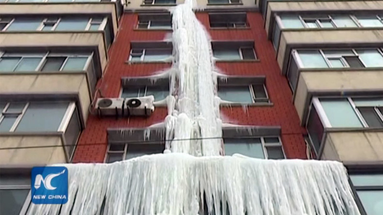 Leaky water heater causes gorgeous ice structure on Chinese building