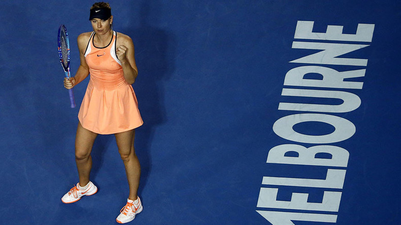 Sharapova changes dress, wins 600th career match