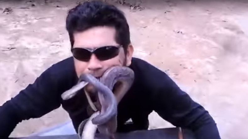 Brazil’s ‘snake ninja’ puts live snakes in mouth to protest deforestation (VIDEO)