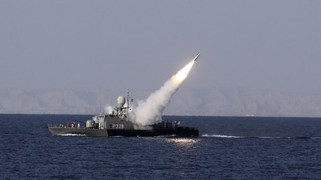 Iran holds naval drills, asks US warship to stay away