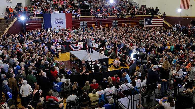 Trump leads crowded GOP field going into Iowa Caucus; Clinton, Sanders tied