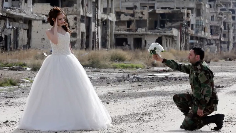 Love in a warzone: Syrian couple’s Homs wedding photoshoot divides opinion