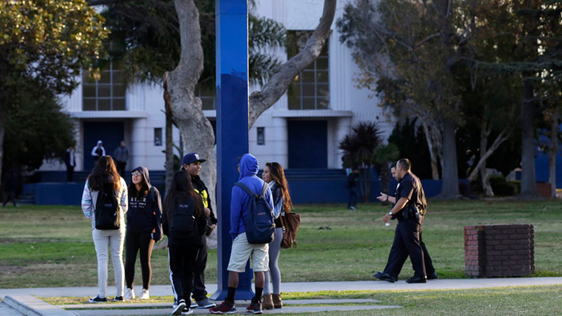 Behind books, not bars: Parents ask high school to stop arresting students