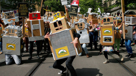 ‘Robot’ activists in Switzerland demand guaranteed income for all humans (VIDEO)