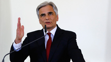 Austrian Chancellor resigns amid party split fueled by huge far-right gains