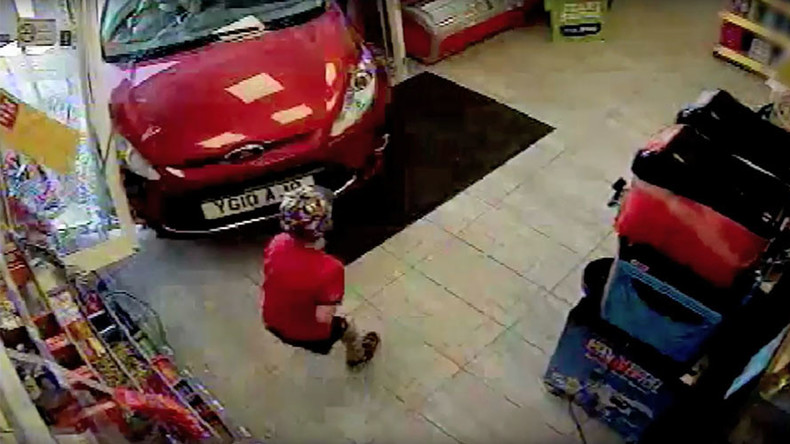 Reckless driver crashes through shop window, knocks down child (VIDEO)