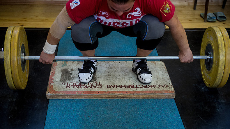 Weightlifting federation bans Russian team from Rio Olympics