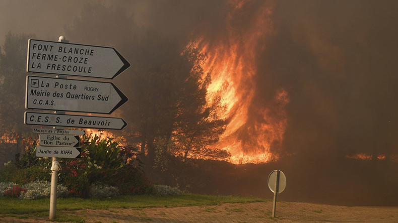 Wildfires rage near Marseille, forcing evacuations & flight diversions (PHOTOS)