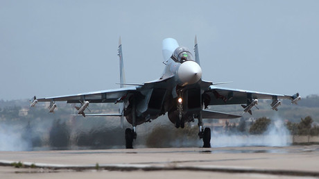 A Russian Su-30 aircraft lands at the Hmeimim airbase in Syria. © Maksim Blinov