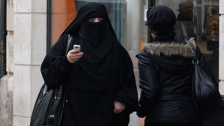 German interior minister calls for partial burqa ban