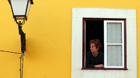 A resident of the downtown area of Leiria city, central Portugal © Nacho Doce