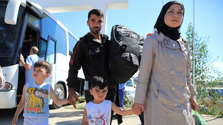 Help reunite refugee families, 200 faith leaders tell Theresa May