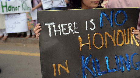 Pakistani human rights activists hold placards during a protest in Islamabad. File photo. © Aamir Qureshi