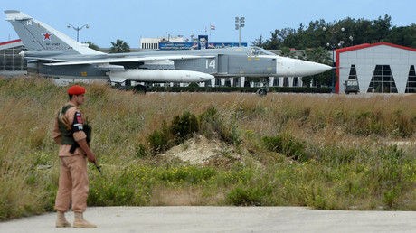 A Russian Su-24 aircaft on a runway at the Hmeimim airbase in Syria. © 
Maksim Blinov