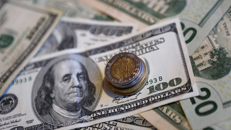 Dollar hovers around 14yr high closing in on parity with euro