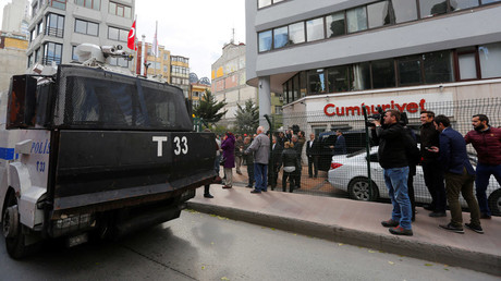 An armored police vehicle drives past by the headquarters of Cumhuriyet newspaper, an opposition secularist daily, in Istanbul, Turkey, October 31, 2016. © Murad Sezer