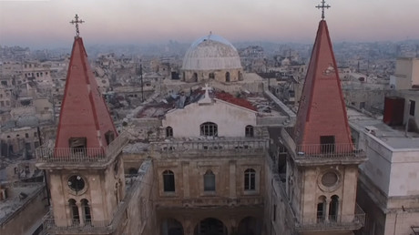 War-torn Aleppo celebrates Christmas, shares stories of joy & loss with RT (EXCLUSIVE)