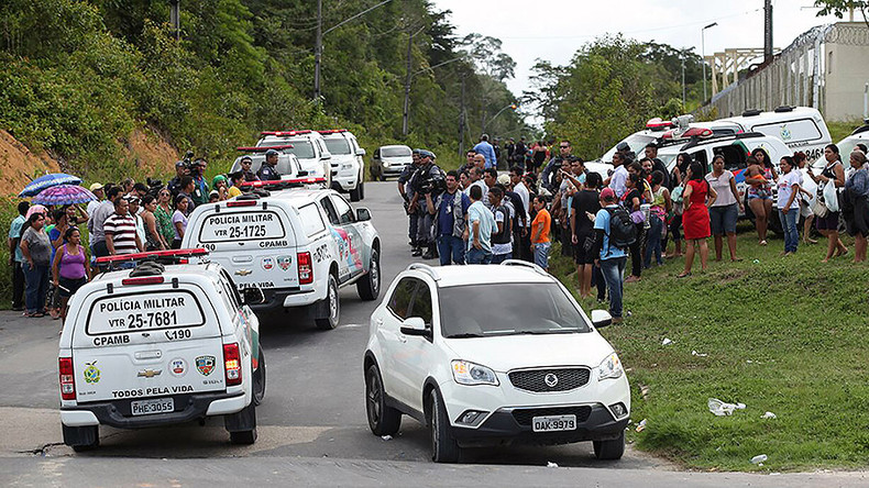 60 dead, hundreds escape in Brazil prison riot