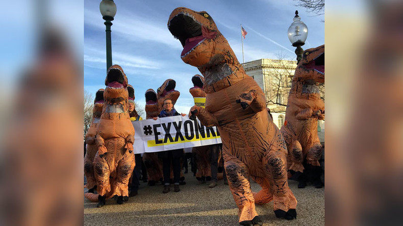 Dinosaur-clad crowds protest Rex Tillerson Senate hearing (VIDEOS ...