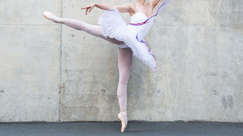 Ballerina dances on busy Moscow road in temperature of -17C… and no one is sure why (VIDEO)