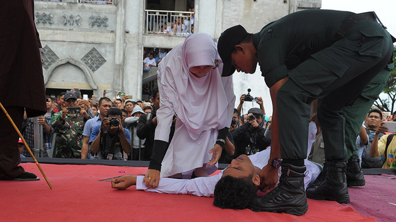 Indonesian Man Faints During Caning Revived And Caned Again Photos — Rt World News