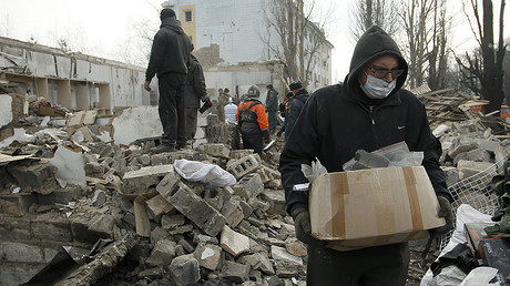 Dealing with damage: Locals in Donetsk clear debris after days of shelling (EXCLUSIVE)