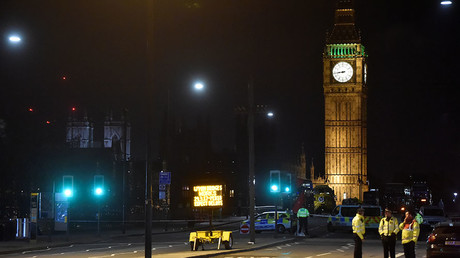Police officers work at the scene after an attack on Westminster Bridge in London, Britain, March 22, 2017. © Hannah McKay