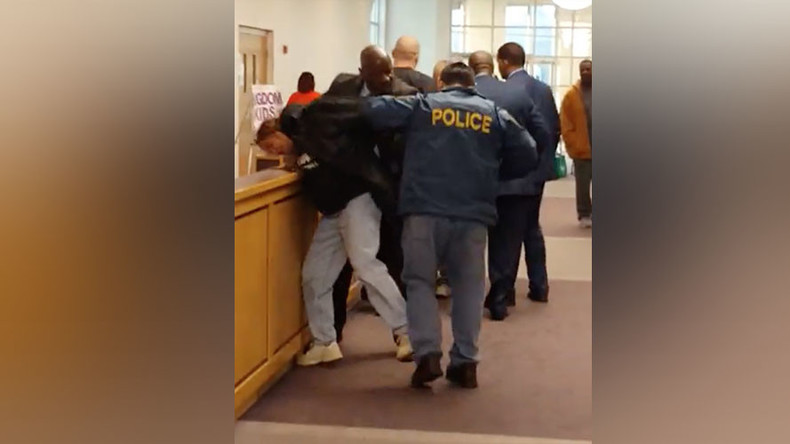 6 arrested at contentious Flint water town hall meeting
