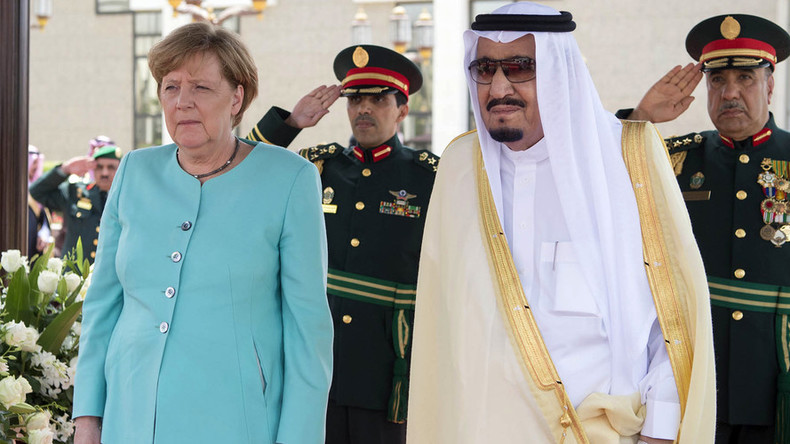 Merkel meets Saudi King without hijab, talks business, not women’s rights